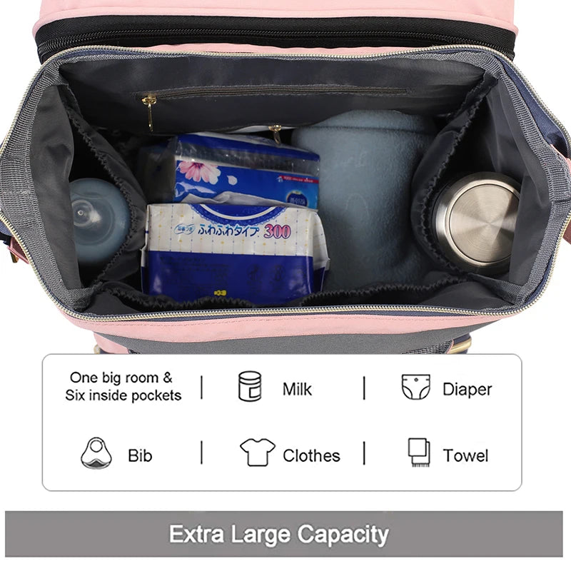 Mum bag with changing area/crib
